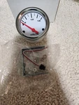 Speedway Electric Voltmeter Gauge, 2-1/16 Inch, White New Open Box. Fixed Price $25.00.