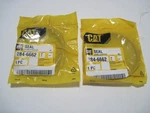 Nos (2) Caterpillar 284-6662 Seal Genuine Oem New Old Stock. Fixed Price $83.69.