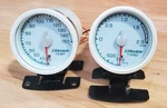 Greddy Trust White 60MM Temp And Boost Gauges. Fixed Price $270.00.