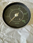 Porsche 911 Speedometer Green Face Date Stamped 7.65. Fixed Price $560.00.