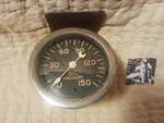 Vintage Stewart Warner Crescent Moon Curved Glass Lense Oil Pressure Gauge!. Fixed Price $150.00.
