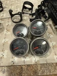 4 Autometer Elite Water Pressure, Temperature, Fuel Gauges 2-1/16. Fixed Price $385.00.