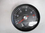 Porsche 914-4 Tachometer 914-641-302-10 Silver Center Original Tested Good. Fixed Price $295.00.