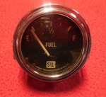 Vintage Stewart Warner Big Block Logo 2 1/8" Fuel Level Gauge 6 Curved Glass. Fixed Price $150.00.