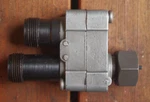 Square Stewartwarner Dual Speedometer Drive Tachograph Adapter Telltale Splitter. Fixed Price $237.50.