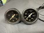 Vintage Stewart Warner 2 Oil Pressure And Water Temperature Gauges With Housing. Fixed Price $59.99.