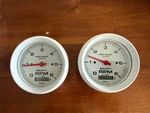Auto Pro-comp White Phantom Marine Tachometer Diameter: 3-3/8. W/hourmeter. Fixed Price $250.00.