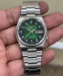 Vintage Seiko 5 Automatic Men's Watch 7009 Arabic Dial Day Date Japan Made. Fixed Price $120.00.
