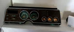 1974-1978 Ford Mustang Instrument Cluster And Bezel Wood Grain Pattern. Fixed Price $325.00.