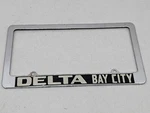 Delta Ford Bay City Michigan Vintage Dealer License Plate Steel Frame Bezel. Fixed Price $99.95.