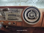 Speaker Grill & Clock Fits 1954 Pontiac 1350627. Fixed Price $100.00.