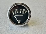 Used 2 1/4" Diameter Stewart Warner Mechanical Oil Pressure Gauge To 80#. Fixed Price $50.00.
