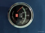 Stewart Warner O-6000 Rpm 2 5/8" Green Line Tach. Fixed Price $500.00.